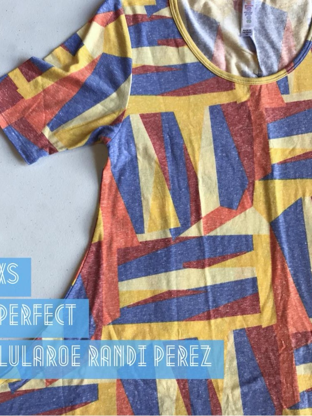 LuLaRoe Short Sleeve Tee in Yellow, Blue & Orange Geometric Print